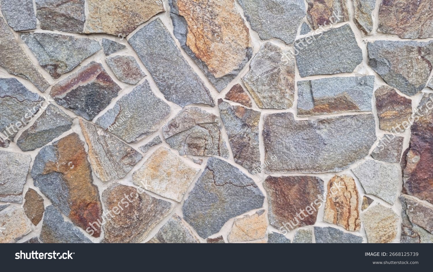 Natursteinwand Buntes Granitmosaik