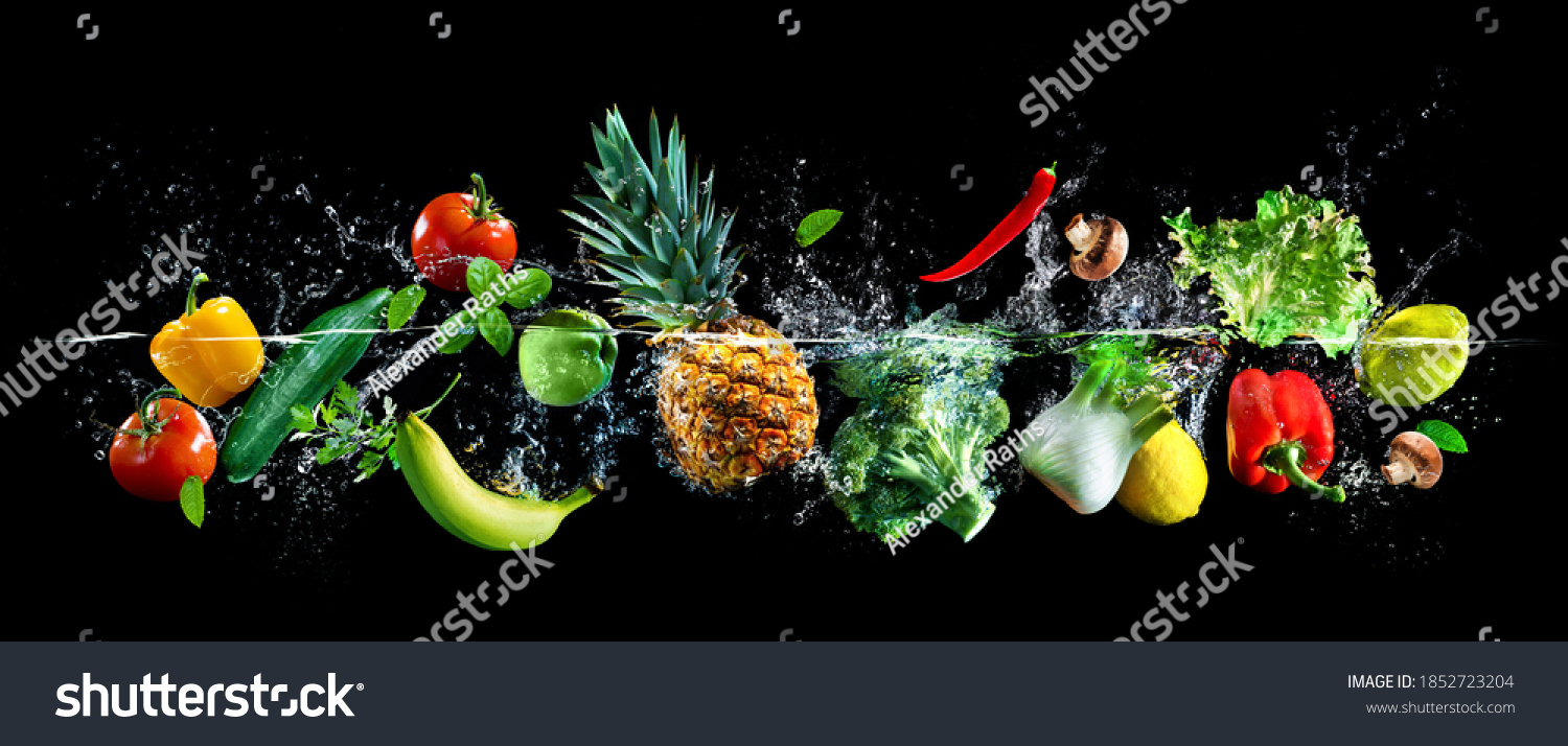 Gemüse und Früchte im Splash-Effekt